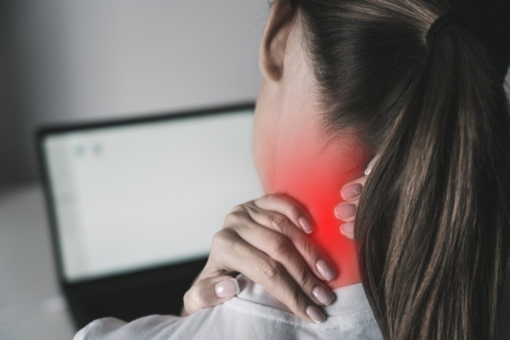 women suffering from neck pain.  